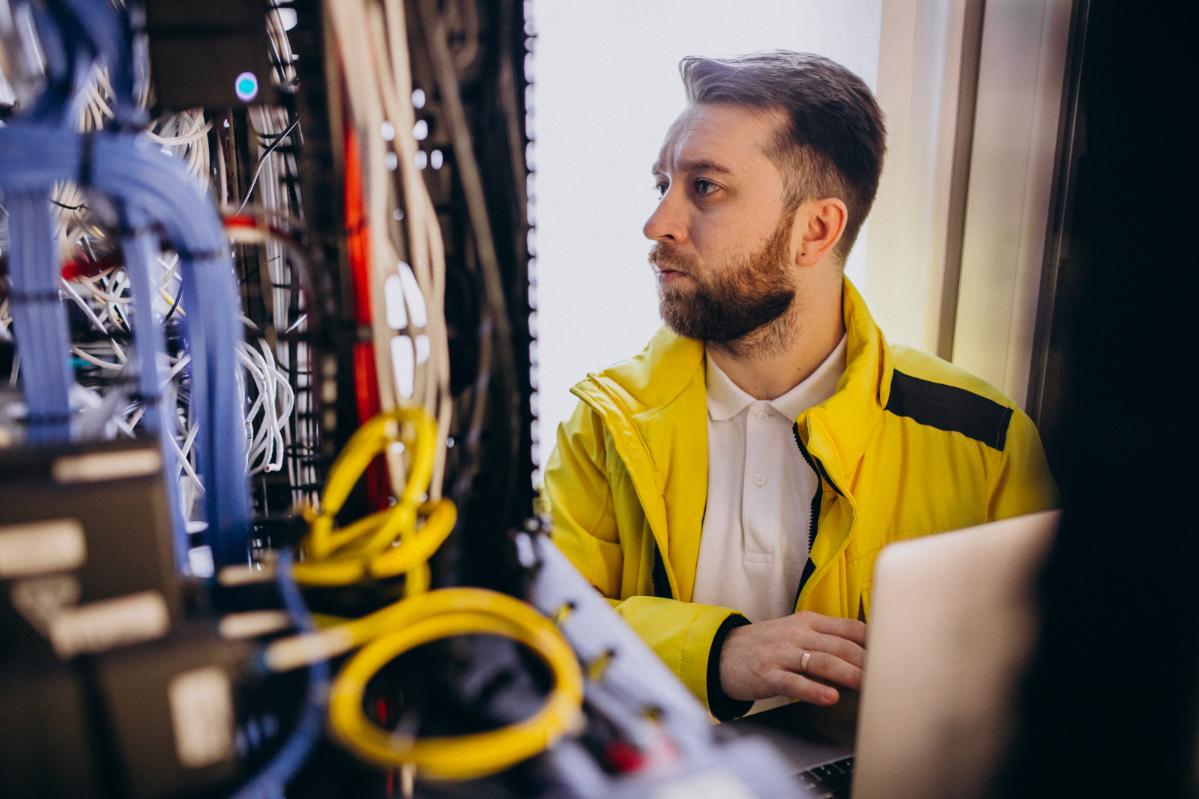 young man engineer making program analyses (1)